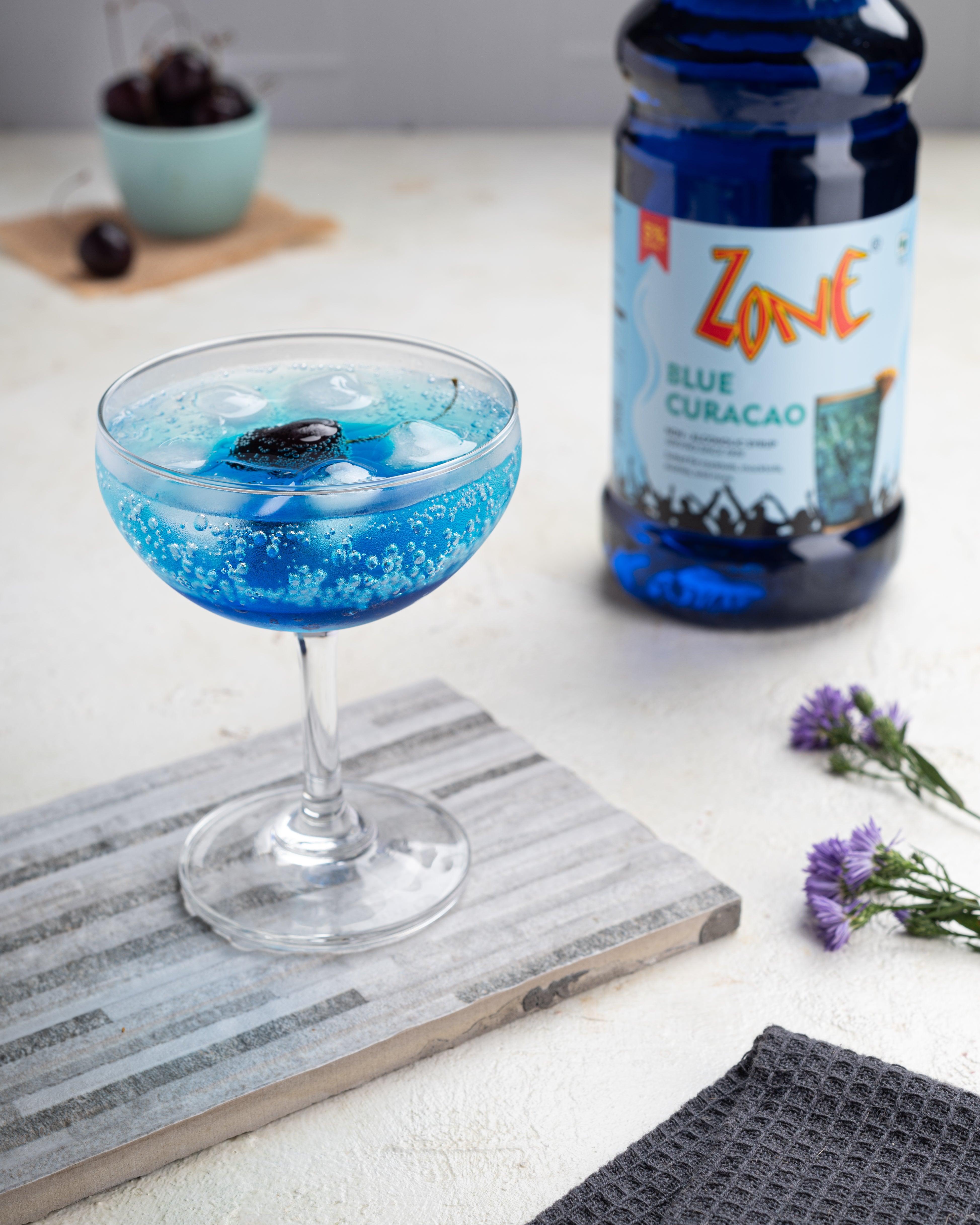 Tropical Azure Drink made with Zone Blue Curacao ZONE